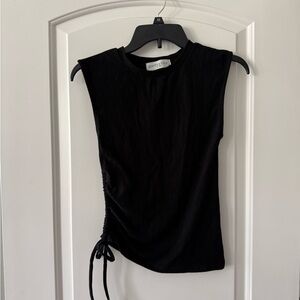 Black Sleeveless Muscle Tee by [Brand]